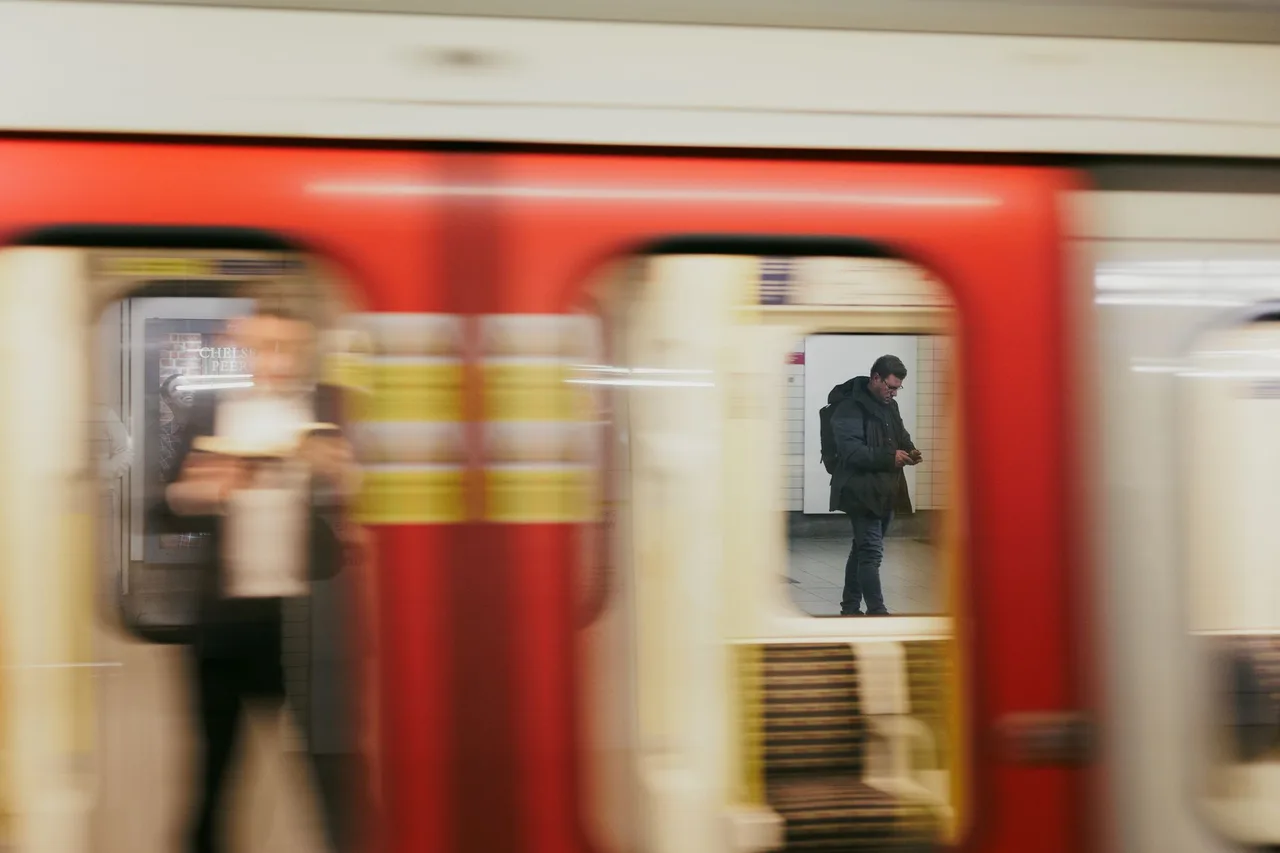 Passengers tapping through the gates of a Seoul subway station