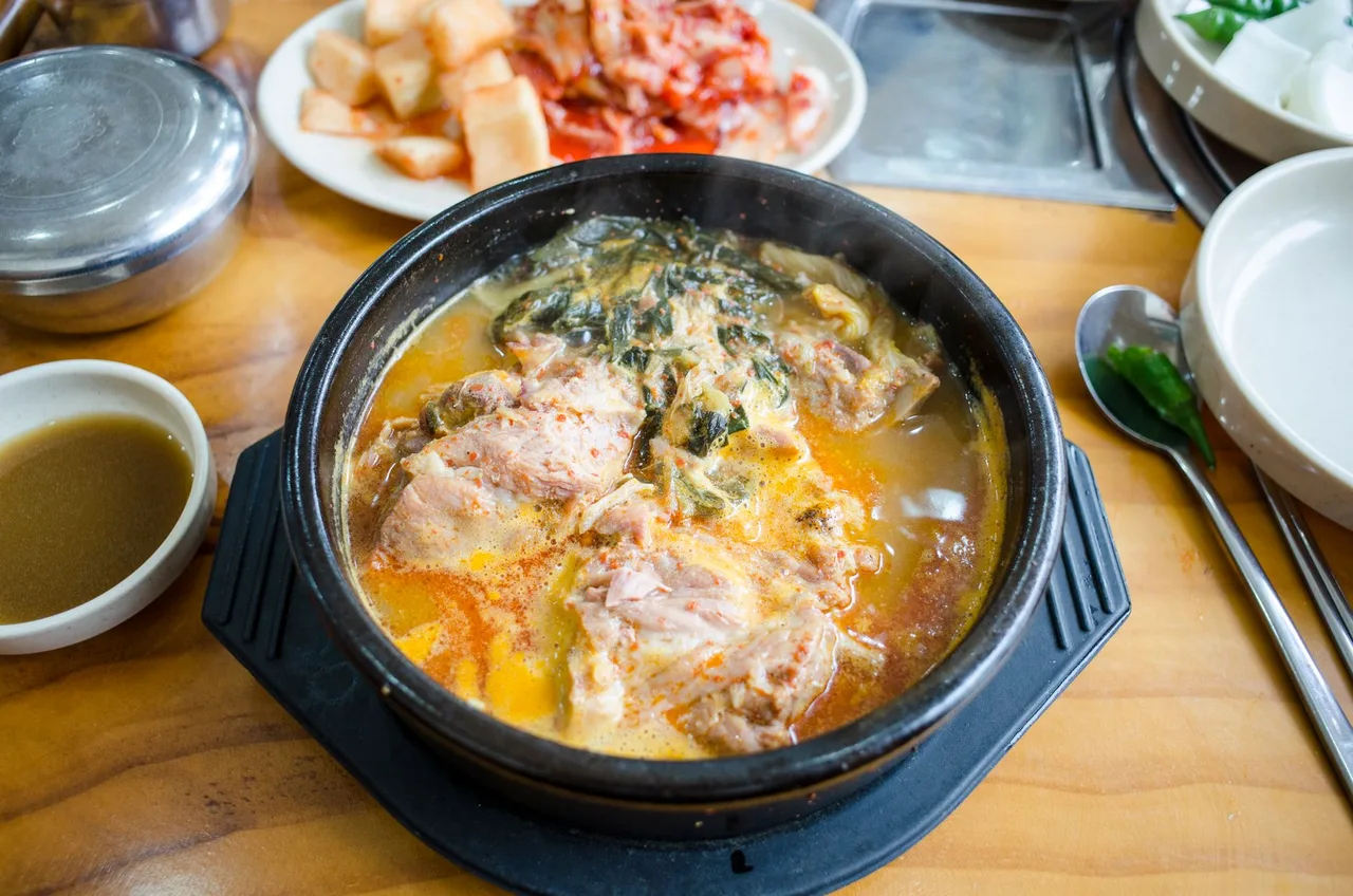 A pot of bubbling Korean kimchi stew