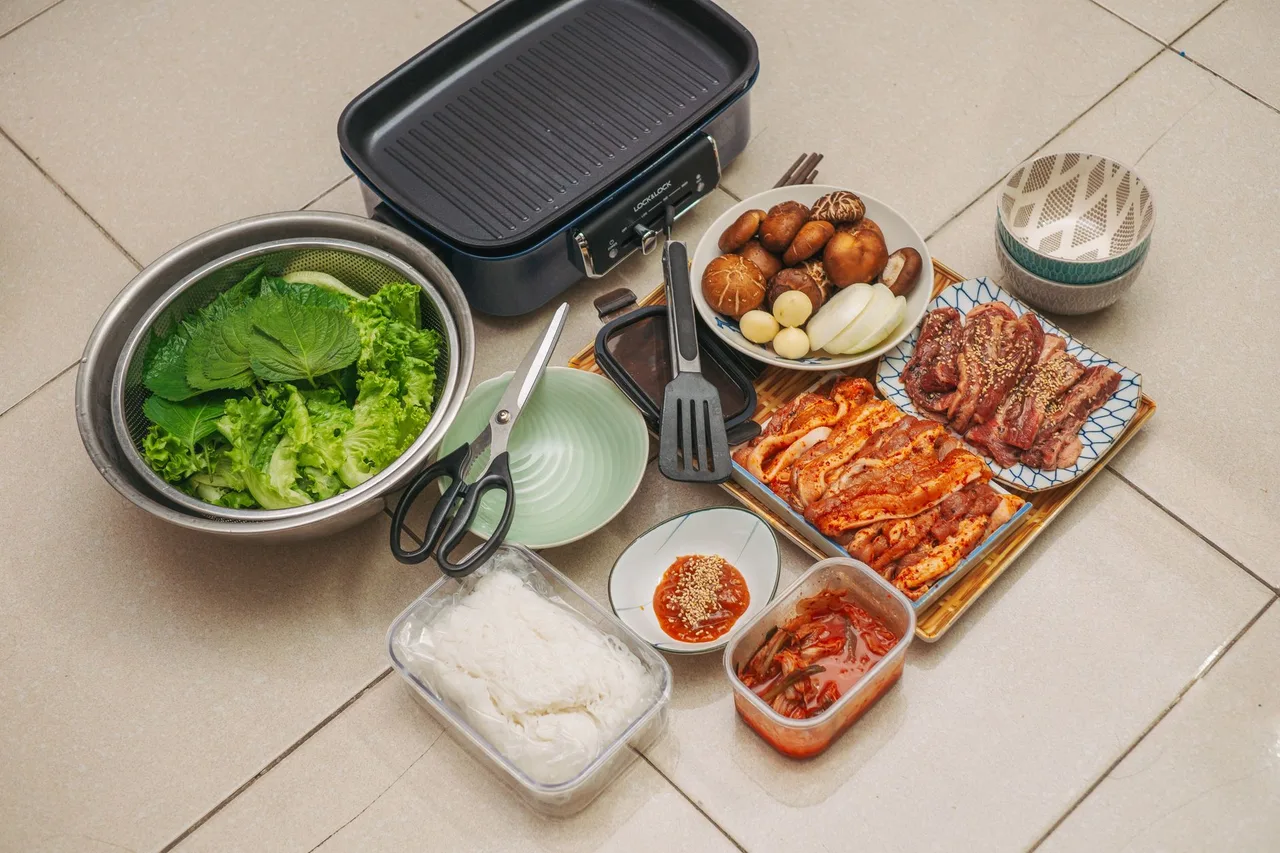 Grilled pork belly cooking on a Korean barbecue grill
